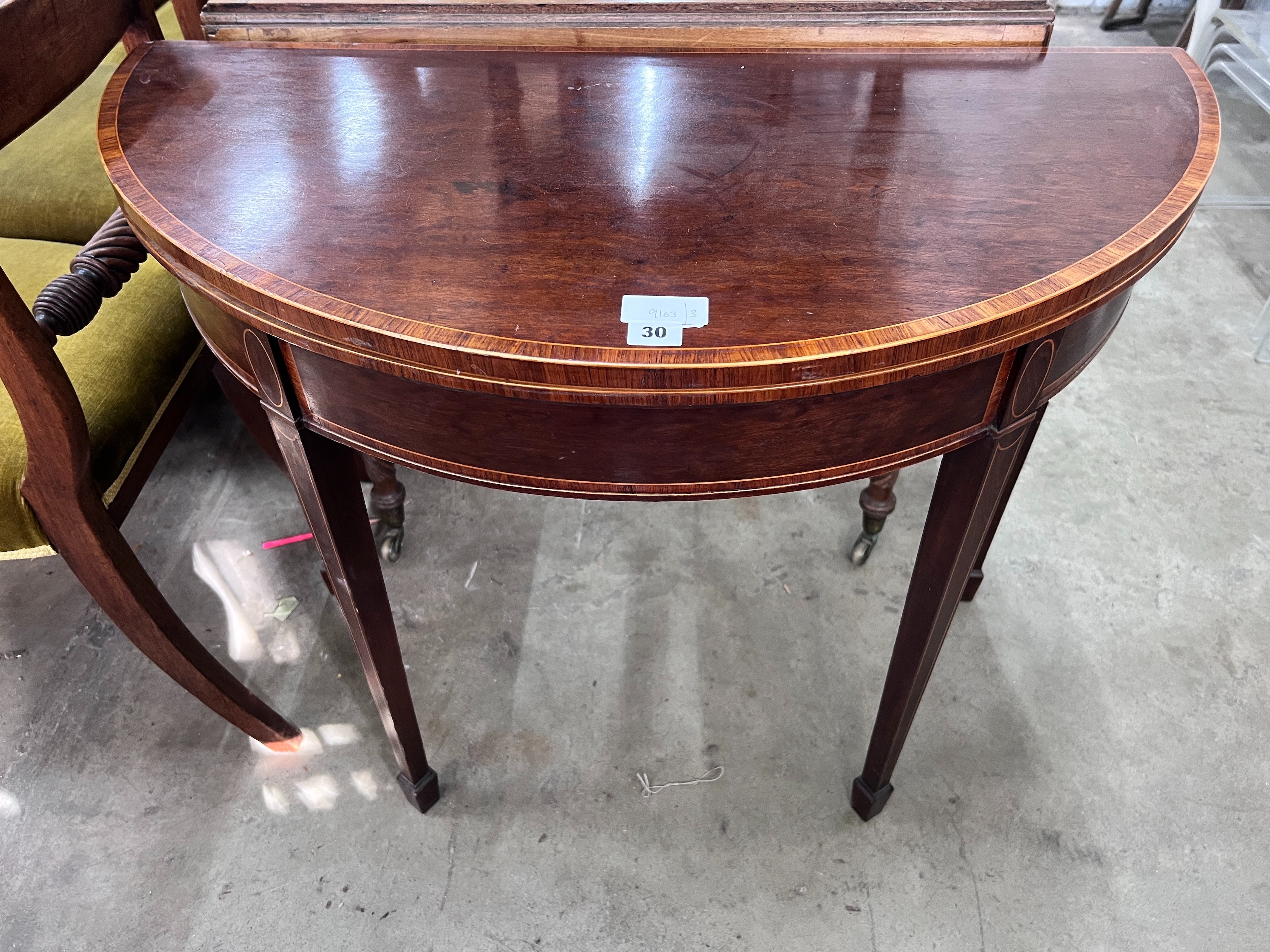 A George III banded mahogany D shape folding card table, width 92cm, depth 45cm, height 73cm *Please note the sale commences at 9am.